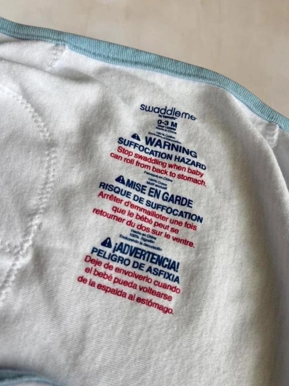 SwaddleMe Baby Sleep Sack Swaddle in White with Light Blue Trim